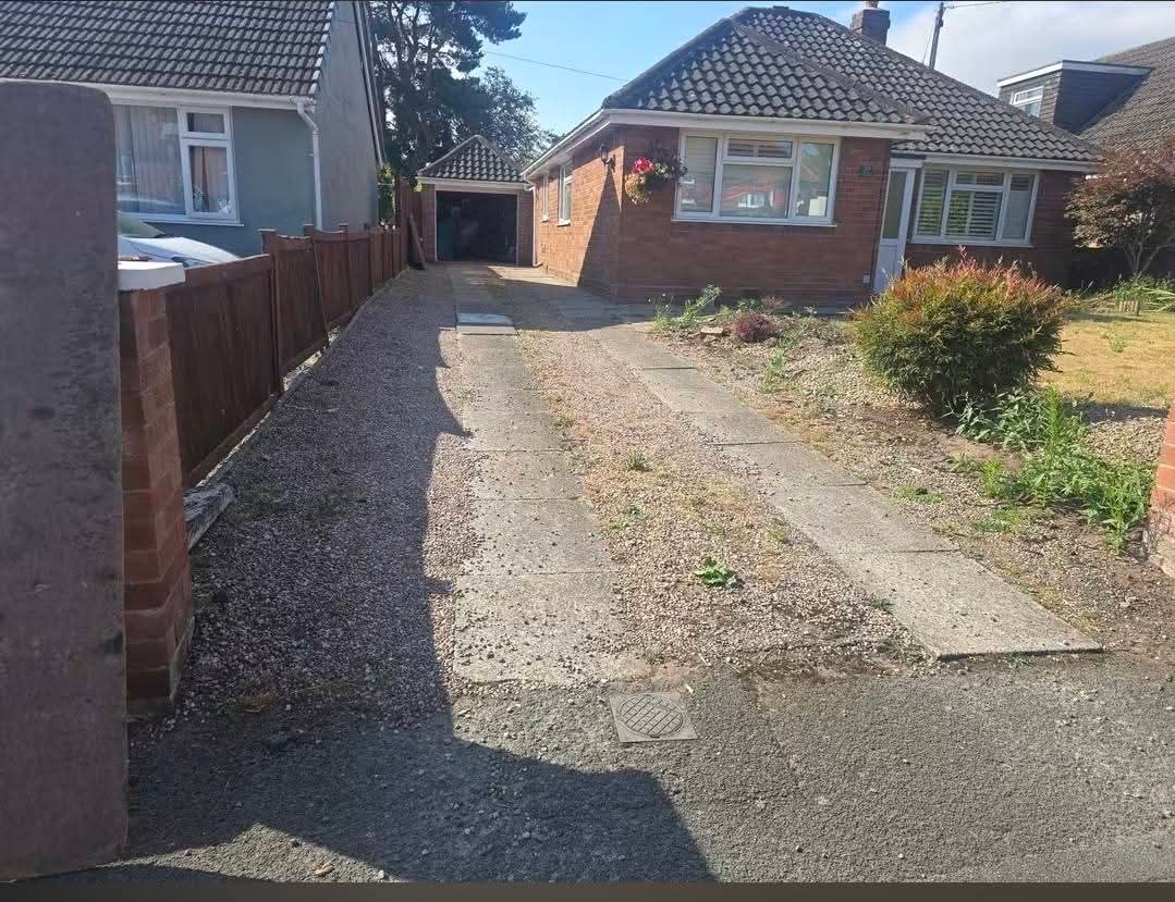 Gravel to tarmac driveway — before